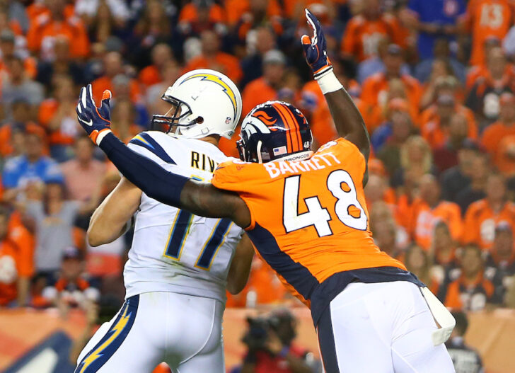 Denver Broncos linebacker Shaquil Barrett (48) sacks Los Angeles Chargers quarterback Philip Rivers (17) in the second half at Sports Authority Field at Mile High.