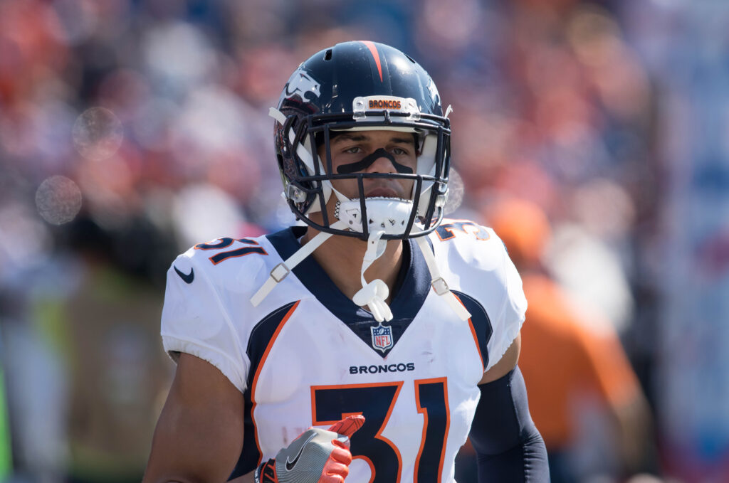 Denver Broncos strong safety Justin Simmons (31) goes to the sideline prior to a game against the Buffalo Bills at New Era Field.