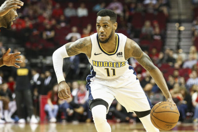 Denver Nuggets guard Monte Morris (11) dribbles the ball during the game against the Houston Rockets at Toyota Center.