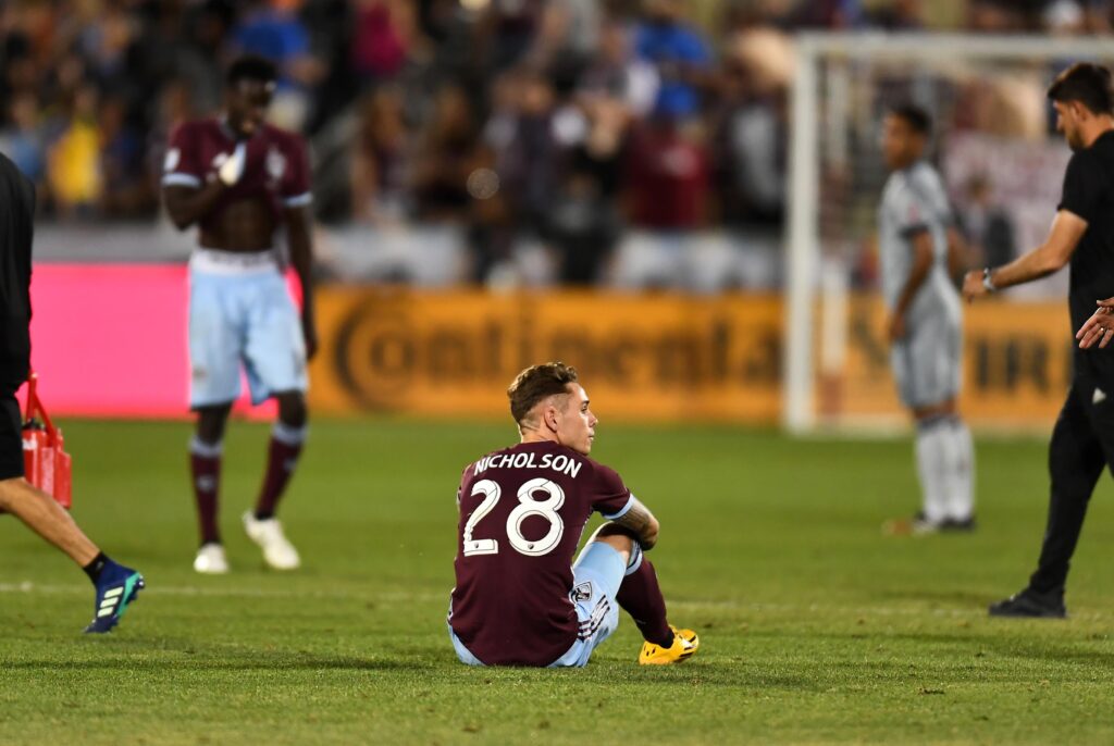 Colorado Rapids midfielder Sam Nicholson (28) sits on the pitch following the draw to the Chicago Fire at Dick's Sporting Goods Park