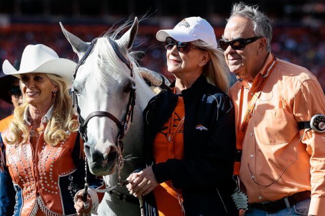 Broncos mascot Thunder with owners Magness and Ernie Blake. Credit: Isaiah J. Downing, USA TODAY Sports.