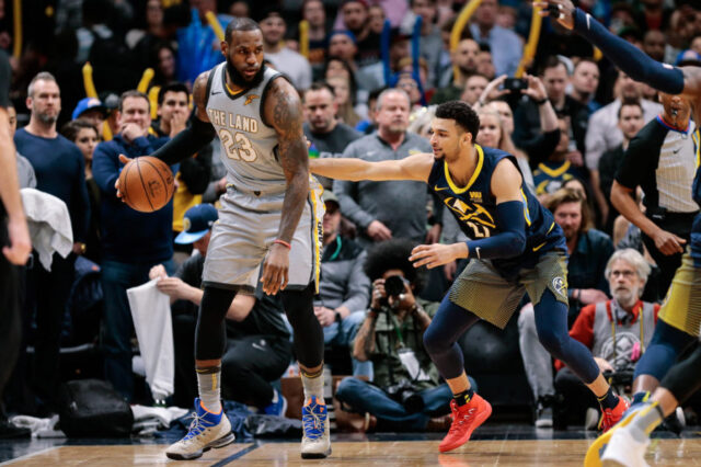 Denver Nuggets guard Jamal Murray (27) guards Cleveland Cavaliers forward LeBron James (23) in the first quarter at the Pepsi Center.