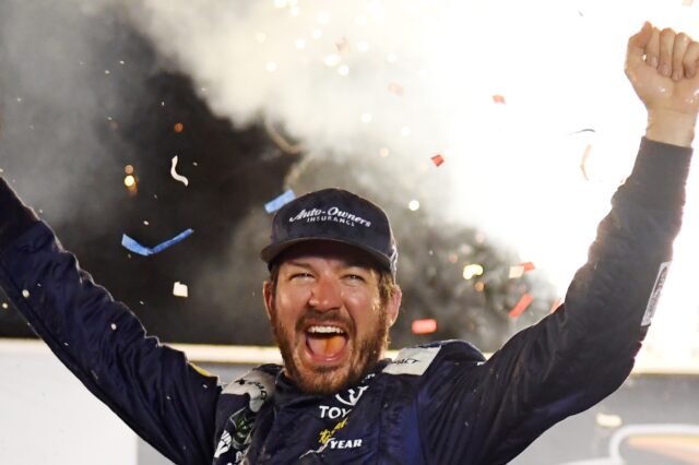 Martin Truex celebrates his win in Kentucky. Credit: Christopher Hanewinkel, USA TODAY Sports.