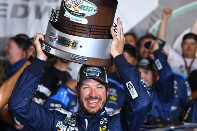 Martin Truex celebrating his win on Sunday. Credit: Christopher Hanewinkel, USA TODAY Sports.