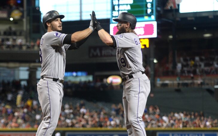 Nolan Arenado and Charlie Blackmon celebrate one of Arenado's homers. Credit: Joe Camporeale, USA TODAY Sports.