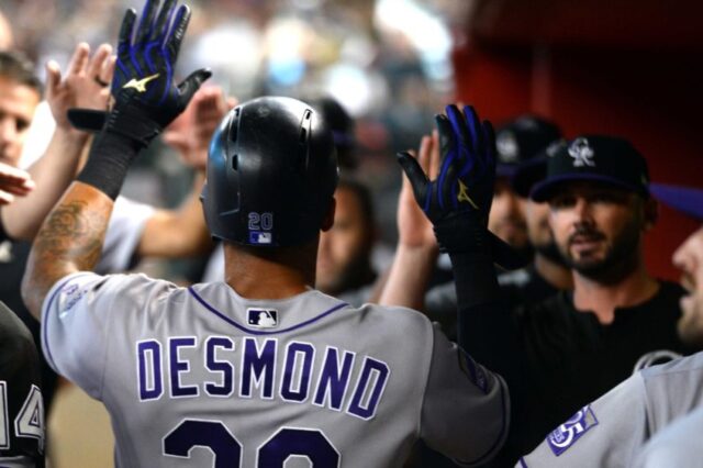 Ian Desmond celebrates a score. Credit: Joe Camporeale, USA TODAY Sports.