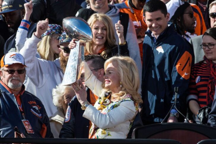 Denver Broncos owners wife Annabel Bowlen lifts the Vince Lombardi Trophy during the Super Bowl 50 championship parade celebration at Civic Center Park.