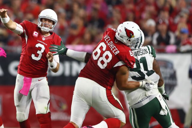 Jared Veldheer blocks from the left tackle spot. He'll be on the right side for Denver this year. Credit: Mark J. Rebilas, USA TODAY Sports.