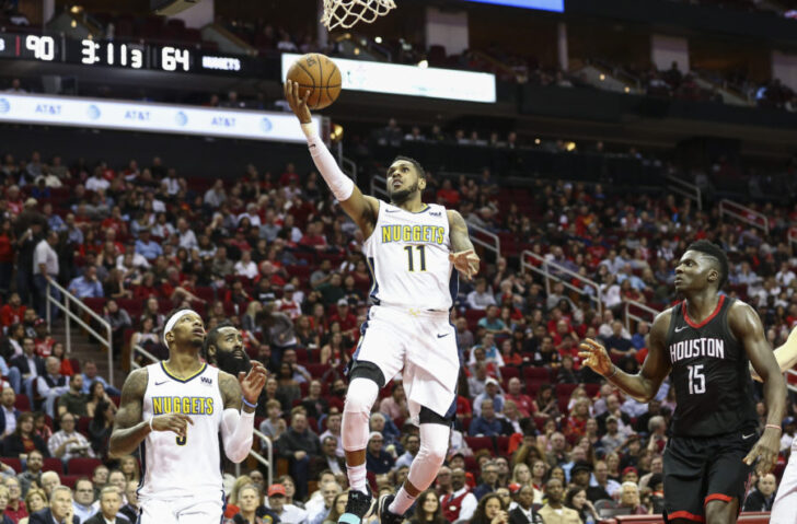 Denver Nuggets guard Monte Morris (11) shoots the ball during the third quarter against the Houston Rockets at Toyota Center.