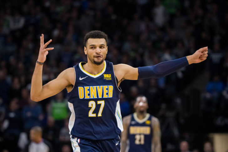 Denver Nuggets guard Jamal Murray (27) celebrates his basket in the fourth quarter against Minnesota Timberwolves at Target Center.