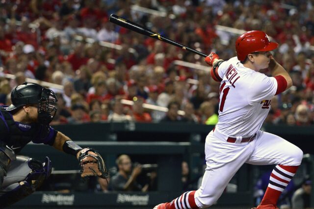 Tyler O'Neil hits a one-run single versus Colorado on Aug. 1 2018. Credit: Jeff Curry, USA TODAY Sports.