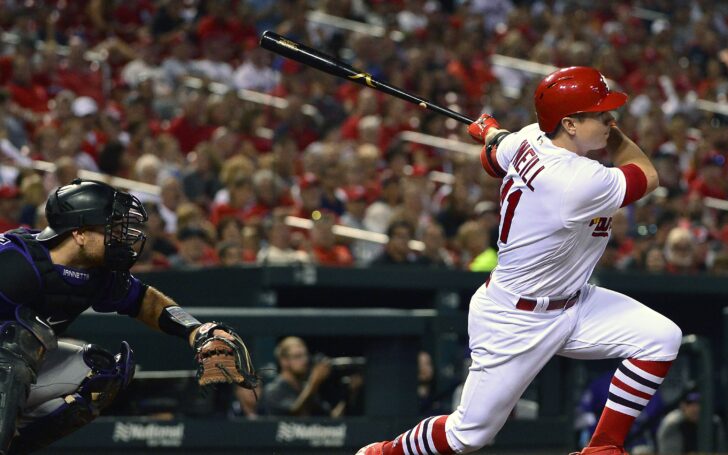 Tyler O'Neil hits a one-run single versus Colorado on Aug. 1 2018. Credit: Jeff Curry, USA TODAY Sports.