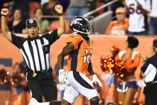 Isaiah McKenzie scores a touchdown on a punt return. Credit: Ron Chenoy, USA TODAY Sports.