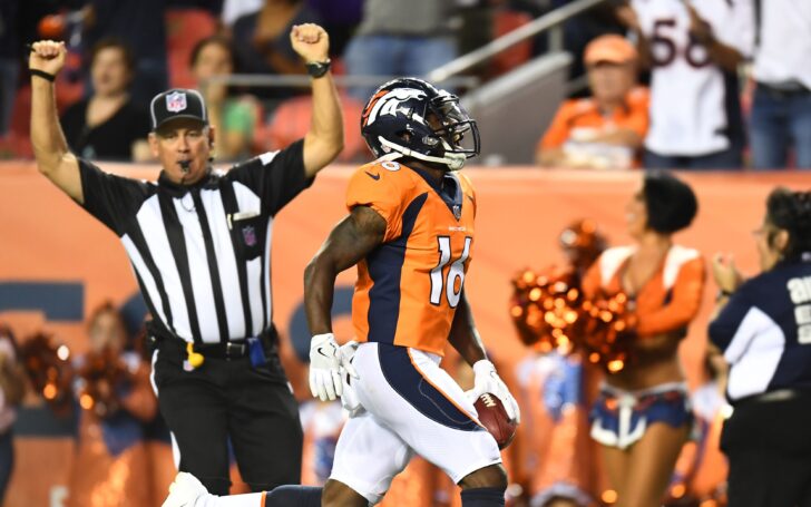 Isaiah McKenzie scores a touchdown on a punt return. Credit: Ron Chenoy, USA TODAY Sports.