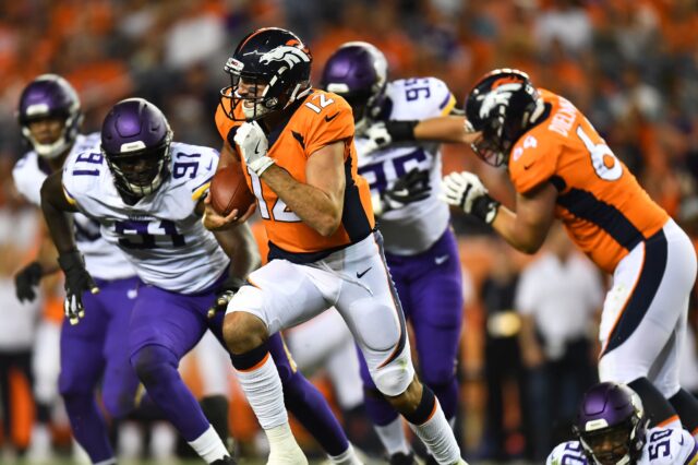 Paxton Lynch scrambles. Credit: Ron Chenoy, USA TODAY Sports.