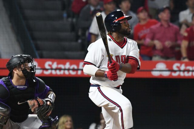 Eric Young hits a clutch two-run single. Credit: Richard Mackson, USA TODAY Sports.