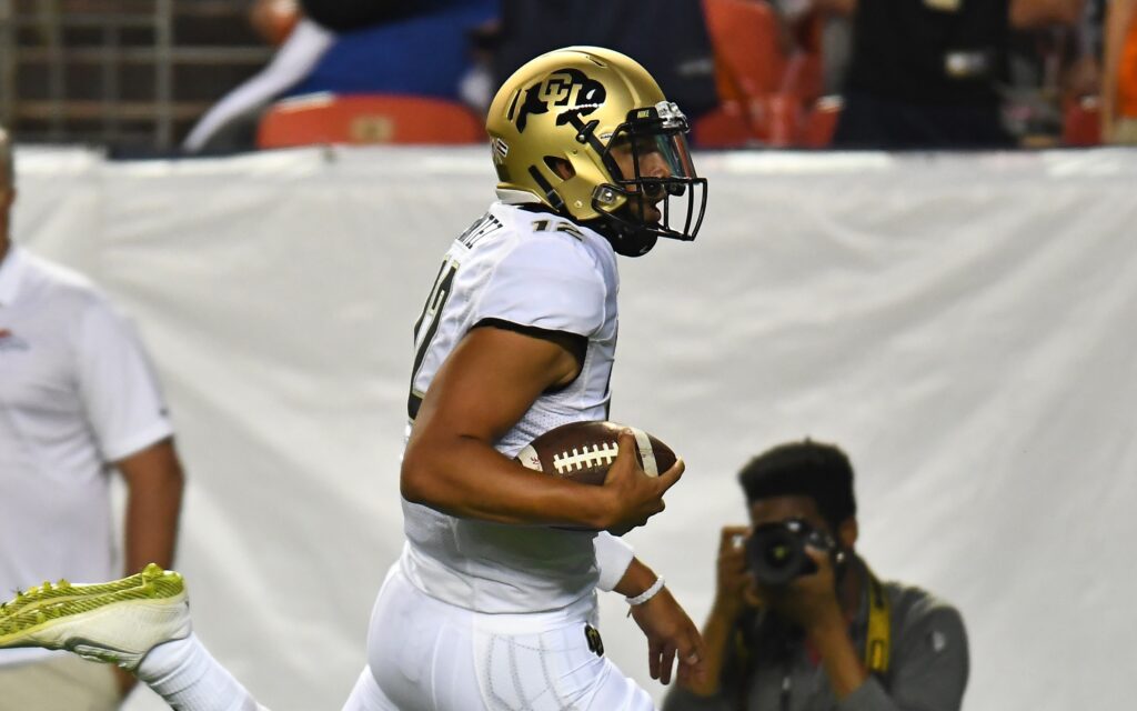 Steven Montez runs for a score. Credit: Ron Chenoy, USA Today Sports.