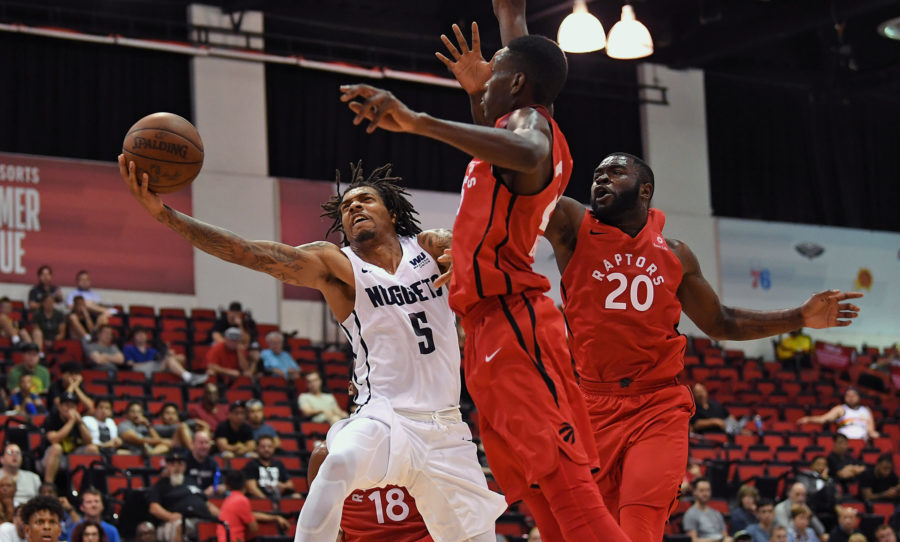 Denver Nuggets guard DeVaughn Akoon-Purcell (5) shoots against Toronto Raptors forward Chris Boucher (25) during the second half at Cox Pavilion.