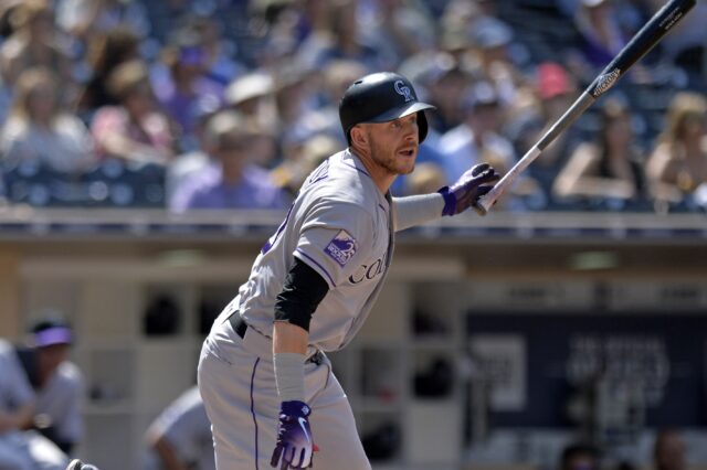 Trevor Story hits a double. Credit: Jake Roth, USA Today Sports.