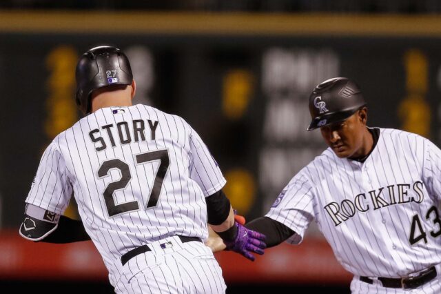 Trevor Story trots around the bases after hitting the longest homer in Coors Field history. Credit: Isaiah J. Downing, USA TODAY Sports.