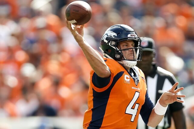 Case Keenum throws on the run. Credit: Isaiah J. Downing, USA TODAY Sports.