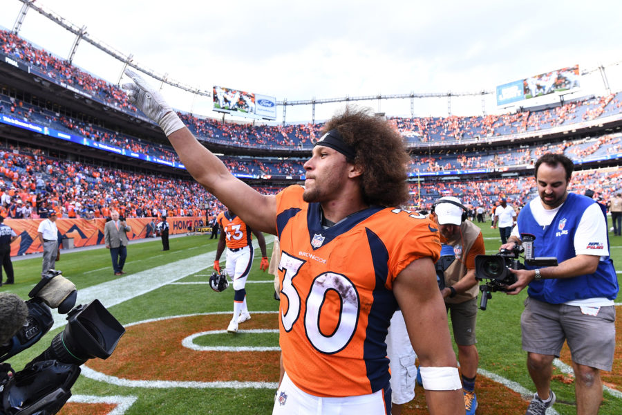 Denver Broncos running back Phillip Lindsay (30) celebrates the win over the Oakland Raiders at Broncos Stadium at Mile High.