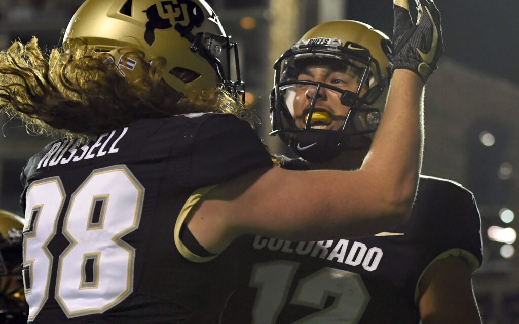 Steven Montez celebrates a touchdown. Credit: Ron Chenoy, USA TODAY Sports.