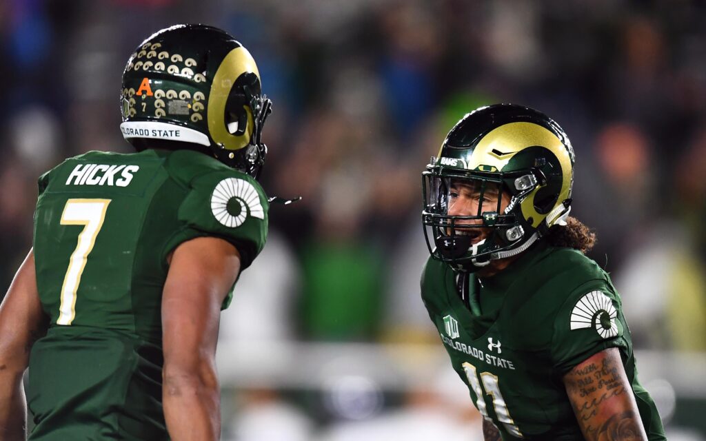 Jamal Hicks and Jordan Fogal celebrate. Credit: Ron Chenoy, USA TODAY Sports.