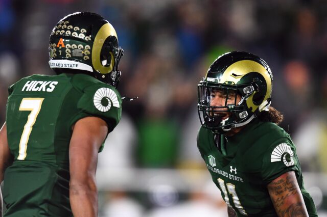 Jamal Hicks and Jordan Fogal celebrate. Credit: Ron Chenoy, USA TODAY Sports.