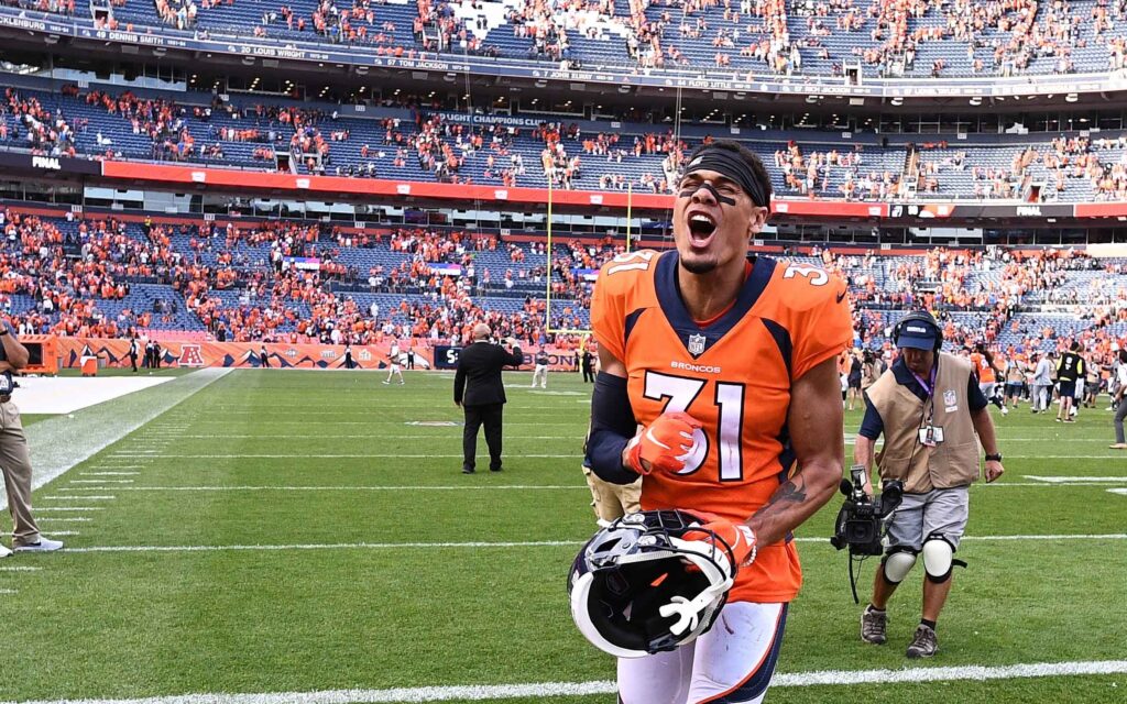 Justin Simmons after Broncos - Raiders game. Credit: Ron Chenoy, USA TODAY Sports.