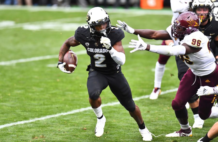 Arizona State Sun Devils defensive lineman Jalen Bates (96) reaches for Colorado Buffaloes wide receiver Laviska Shenault Jr. (2) in the second quarter at Folsom Field.