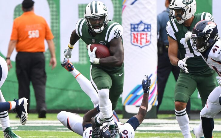 Isaiah Crowell runs over a Broncos defender. Credit: Robert Deutsch, USA TODAY Sports.