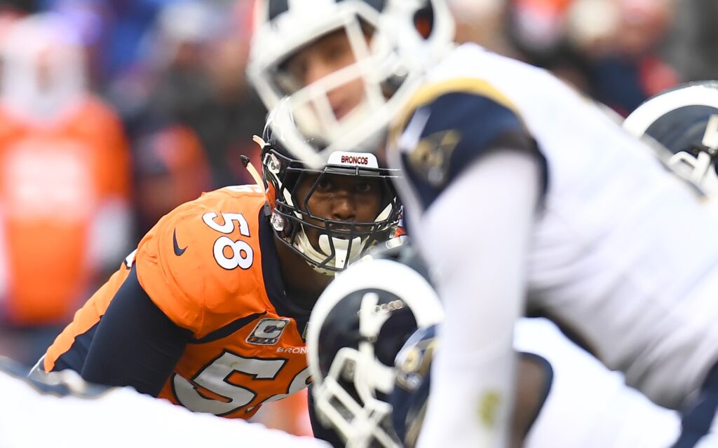 Von Miller stares down Jared Goff. Credit: Ron Chenoy, USA TODAY Sports.