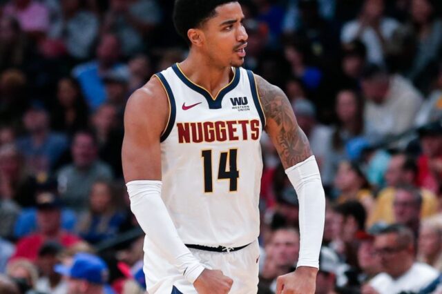 Denver Nuggets guard Gary Harris (14) reacts after a play in the fourth quarter against the Golden State Warriors at the Pepsi Center.