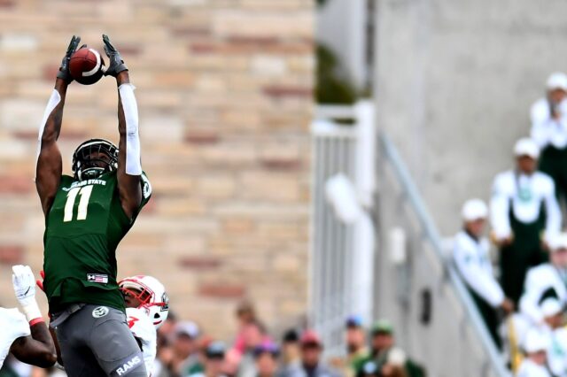 Preston Williams can go up and get the football. But, because of an unnecessary rule, his catch wasn't counted. Credit: Ron Chenoy, USA TODAY Sports.