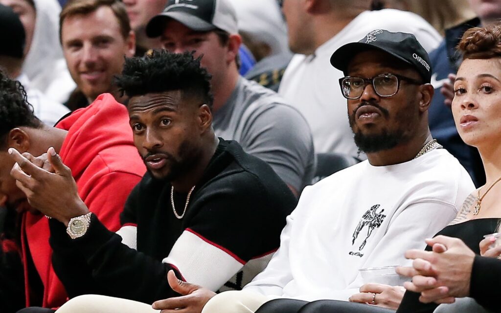 Von Miller and Emmanuel Sanders at a Nuggets game. Credit: Isaiah J. Downing, USA TODAY Sports.