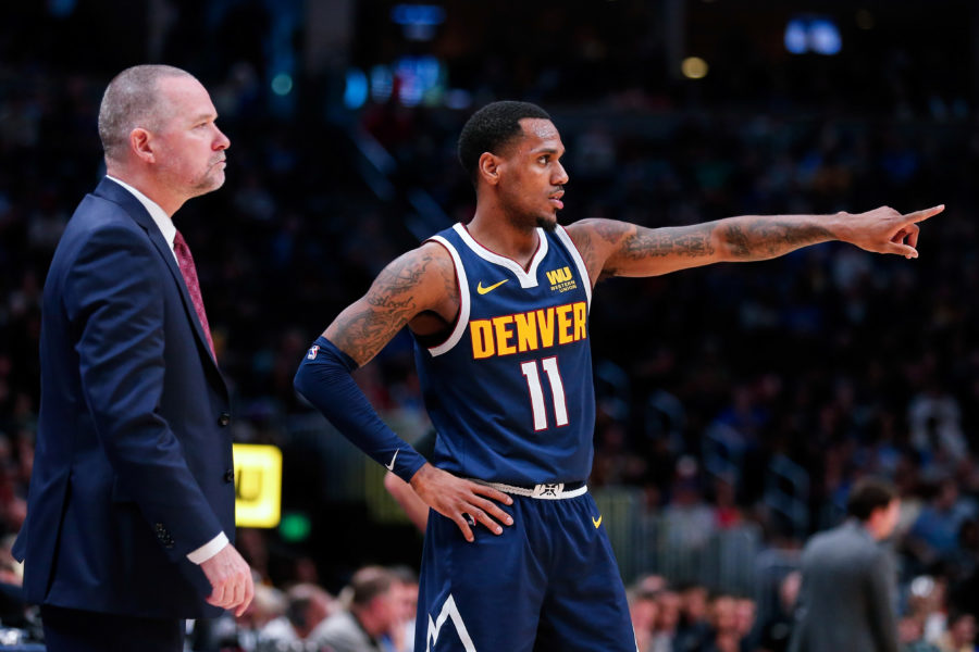 Denver Nuggets guard Monte Morris (11) talks with head coach Michael Malone in the third quarter against the New Orleans Pelicans at the Pepsi Center.