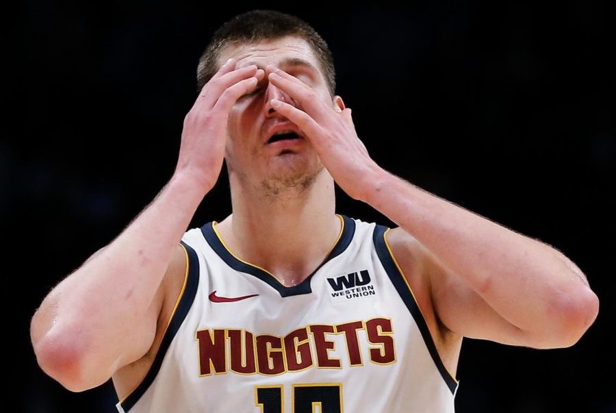 Denver Nuggets center Nikola Jokic (15) reacts in the fourth quarter against the Milwaukee Bucks at the Pepsi Center.