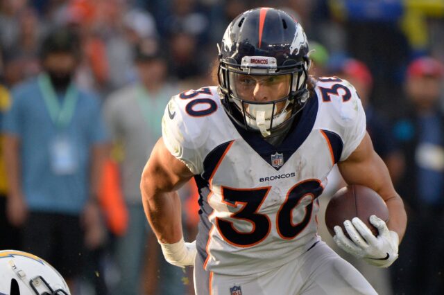 Phillip Lindsay runs. Credit: Jake Roth, USA TODAY Sports.