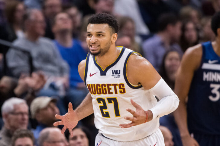 Denver Nuggets guard Jamal Murray (27) celebrates his basket in the third quarter against Minnesota Timberwolves at Target Center.