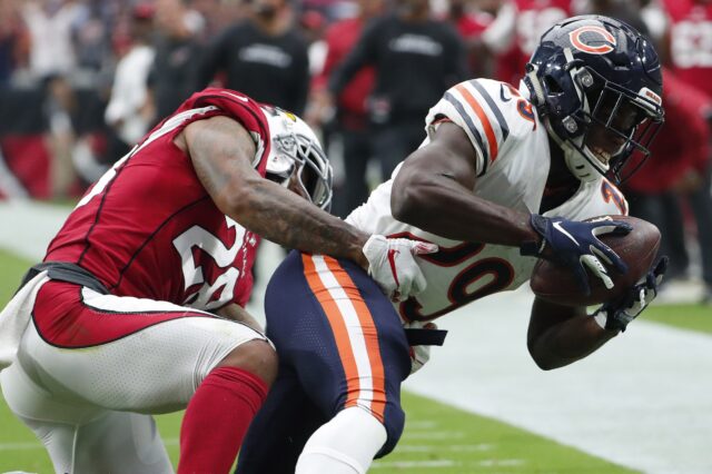 Taylor makes a tackle. Credit: Rob Schumacher, USA TODAY Sports.