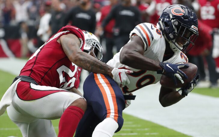 Taylor makes a tackle. Credit: Rob Schumacher, USA TODAY Sports.