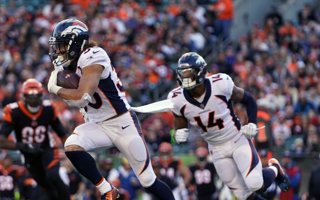 Phillip Lindsay and Courtland Sutton run. Credit: Aaron Doster, USA TODAY Sports.