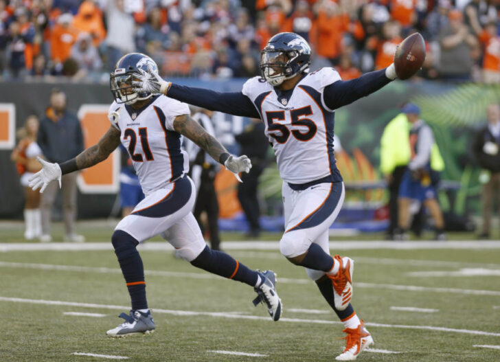 Denver Broncos outside linebacker Bradley Chubb (55) reacts with defensive back Su'a Cravens (21) after Chubb intercepted a pass against the Cincinnati Bengals during the second half at Paul Brown Stadium.