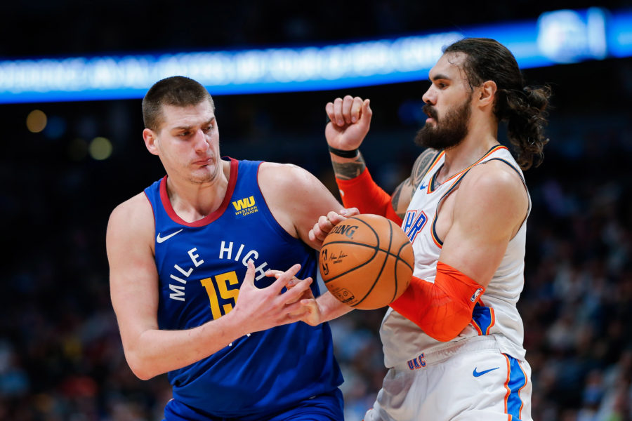 Oklahoma City Thunder center Steven Adams (12) defends against Denver Nuggets center Nikola Jokic (15) in the second quarter at the Pepsi Center.