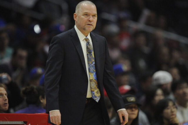 Denver Nuggets head coach Michael Malone watches game action against the Los Angeles Clippers during the first half at Staples Center.