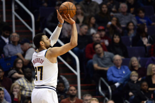 Denver Nuggets guard Jamal Murray (27) shoots against the Phoenix Suns during the first half at Talking Stick Resort Arena