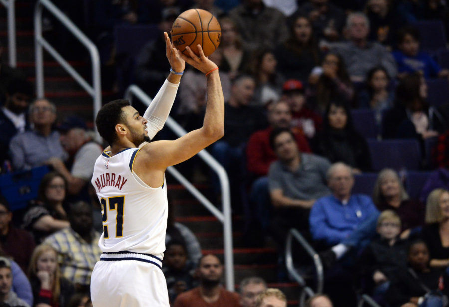 Denver Nuggets guard Jamal Murray (27) shoots against the Phoenix Suns during the first half at Talking Stick Resort Arena