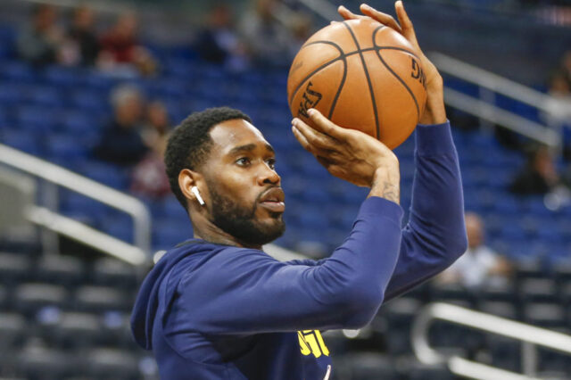 Denver Nuggets guard Will Barton (5) shoots a warmup shot before the game against the Orlando Magic at Amway Center.