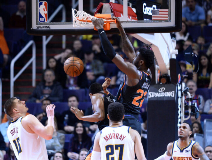 Phoenix Suns center Deandre Ayton (22) dunks against the Denver Nuggets during the second half at Talking Stick Resort Arena.